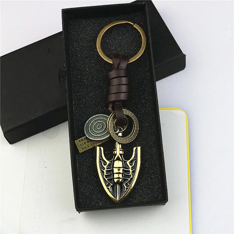 Porte-clés Flèche de Stand dorée JoJo's Bizarre Adventure en cuir et métal
